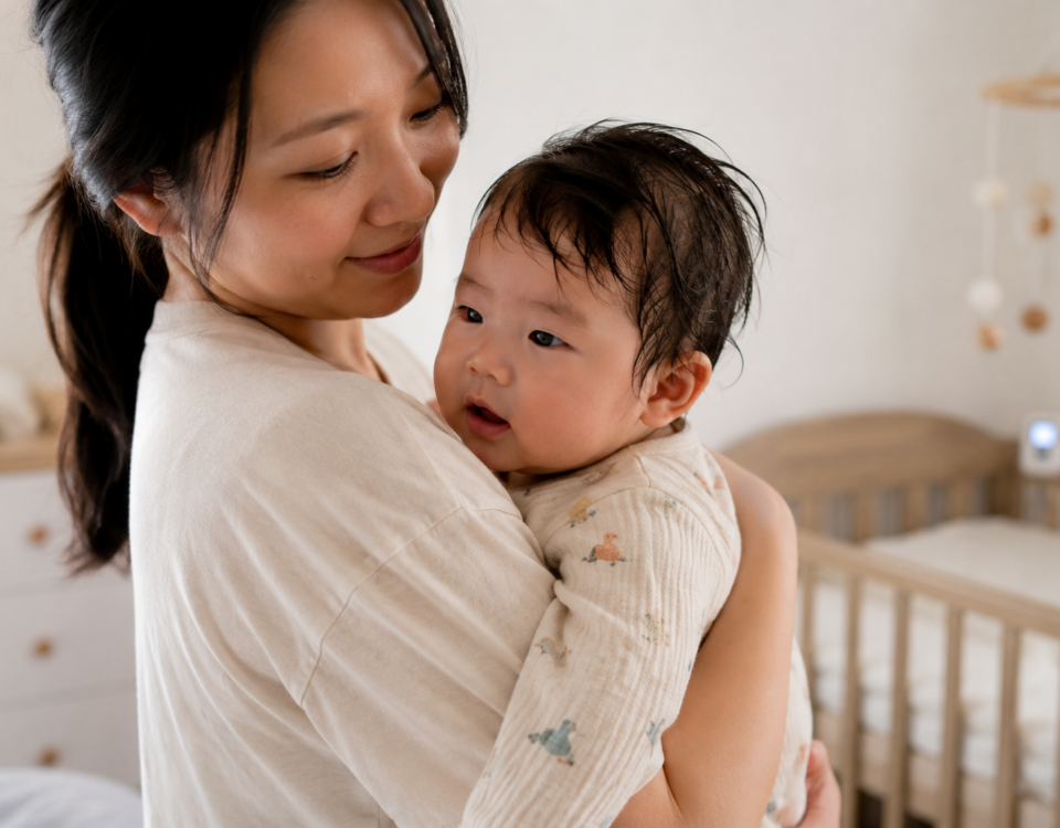 Mother picks up baby after a nap | Baby sweating | SafeSleep | Sleep monitoring devices